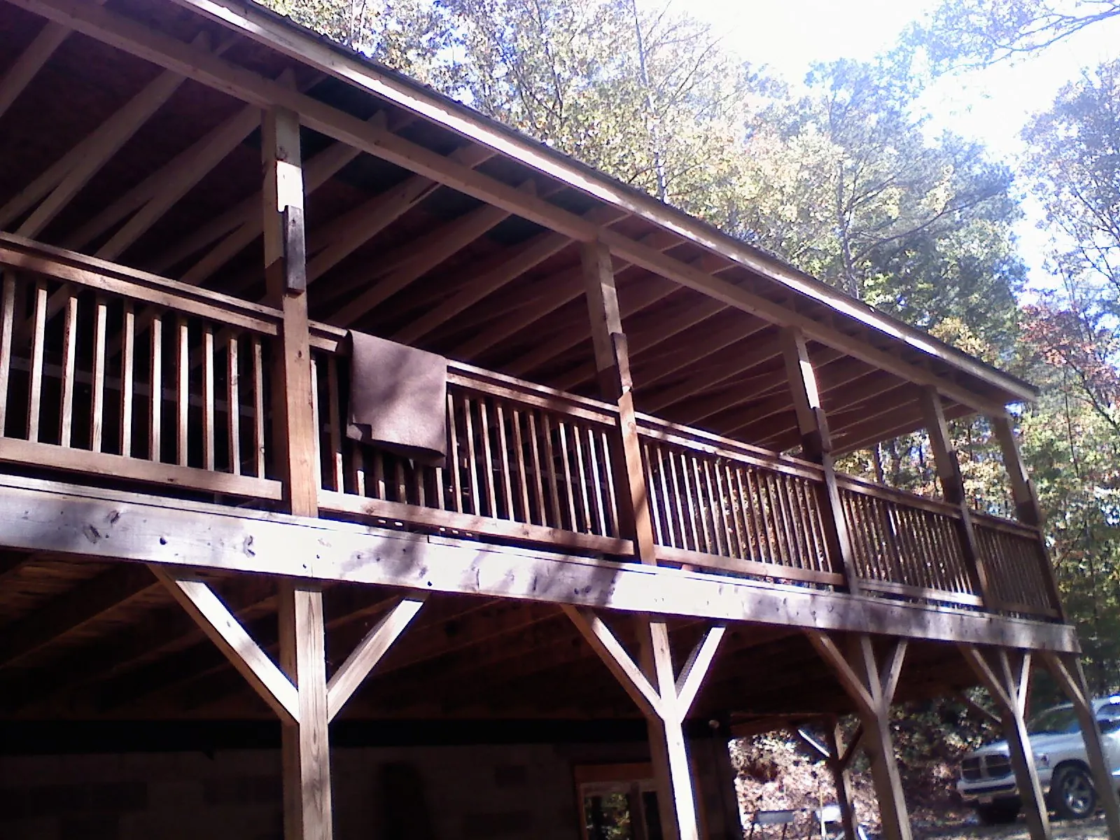 Timber framing under a new elevated porch and deck — Roof Leak Repair in Nineveh by Roofing Brothers